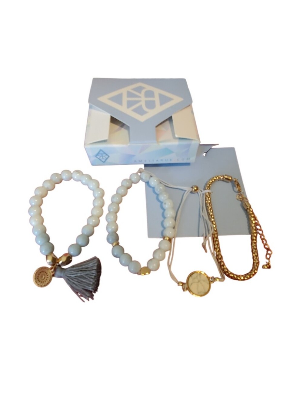 Four Bracelet Set With Gold Accent And Tassel